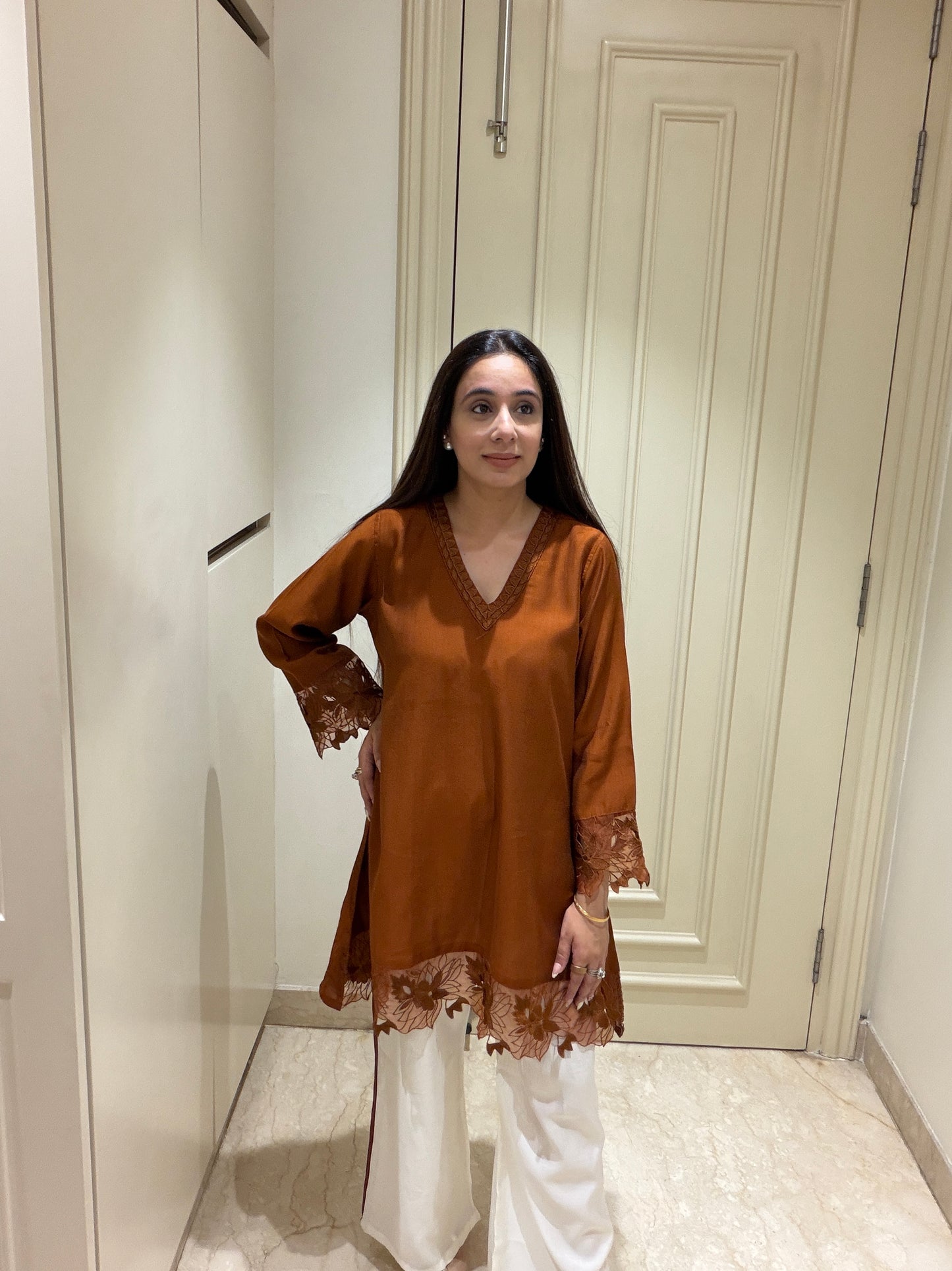 Rich Rust Silk-Blend Tunic with Floral Cutwork & White Straight Pants