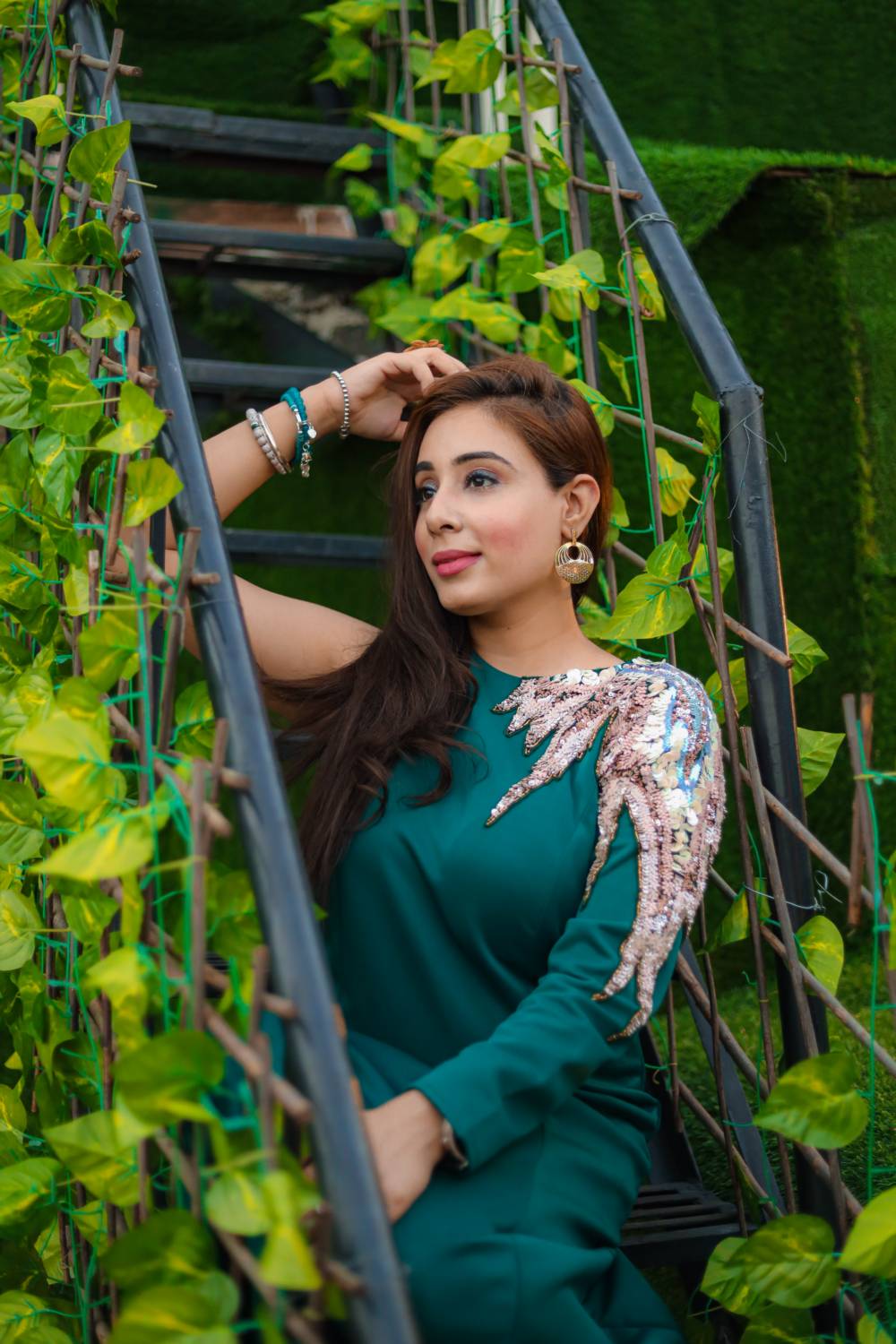 Classy Gown In Emerald Green With Sequence Work