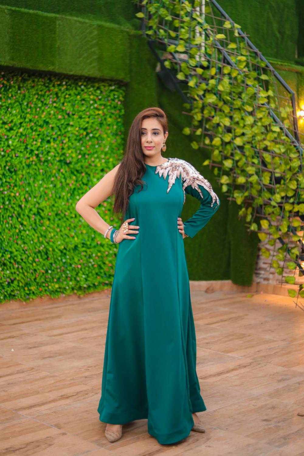 Classy Gown In Emerald Green With Sequence Work